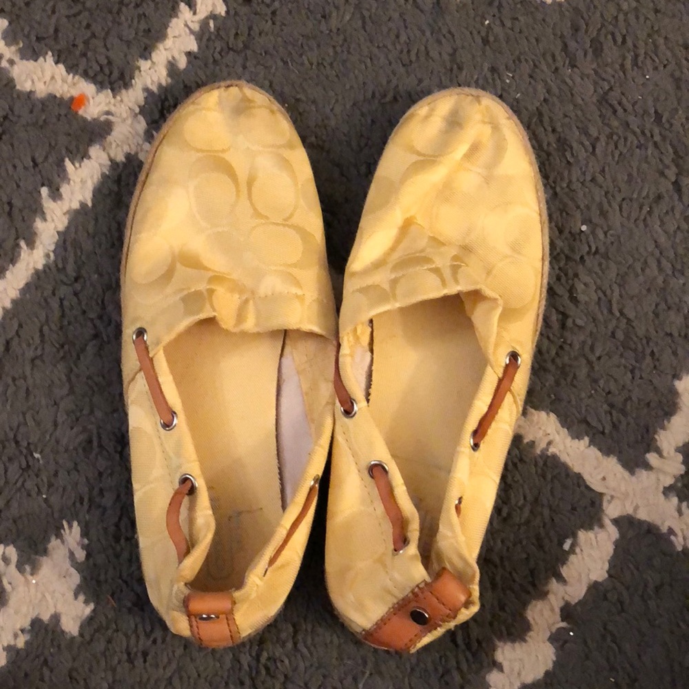 Coach slip ons
